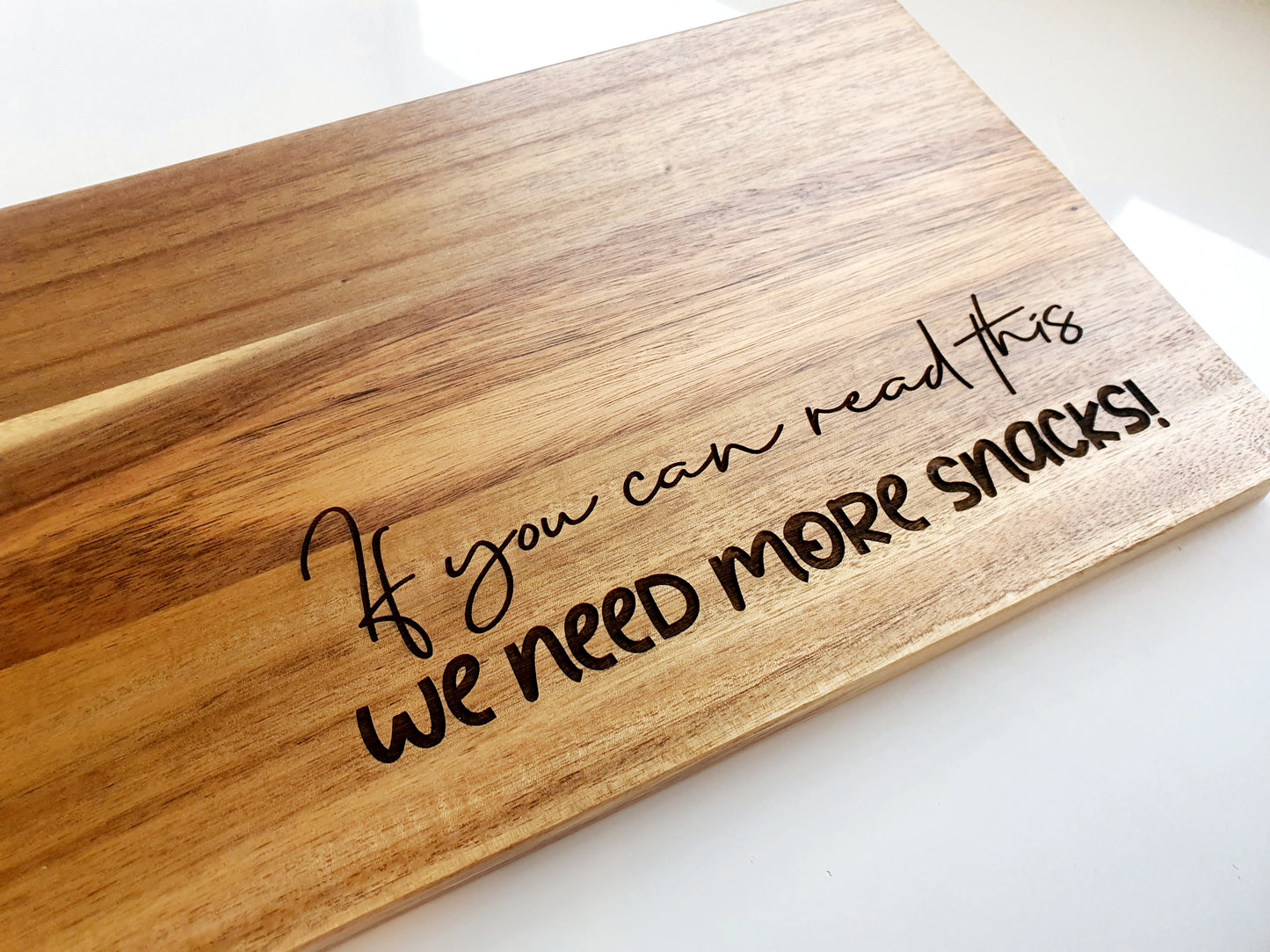 We Need More Snacks Chopping Board