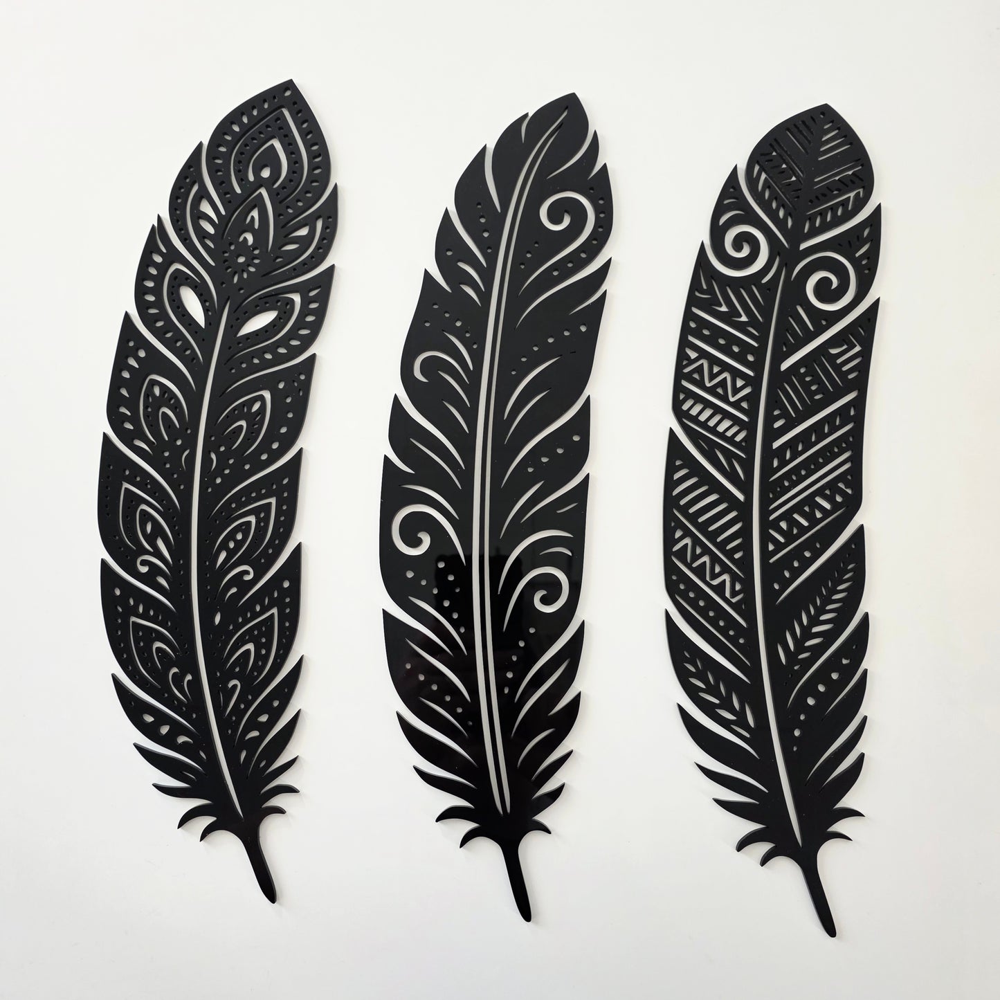 Detailed Huia Feather Trio